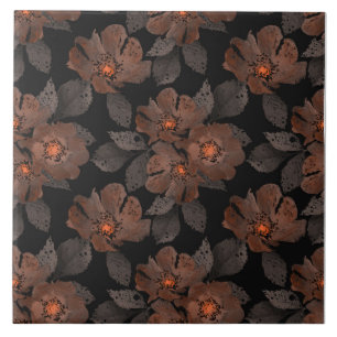 Orange and brown flowers on a black background. tile