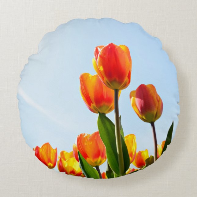 Orange and red tulips from below round pillow (Front)