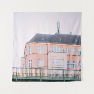 ORANGE AND WHITE CONCRETE BUILDING TAPESTRY