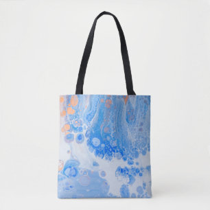 Orange and white jellyfish in water tote bag