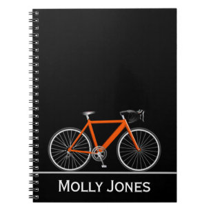 Orange Bike with Name on Black Notebook