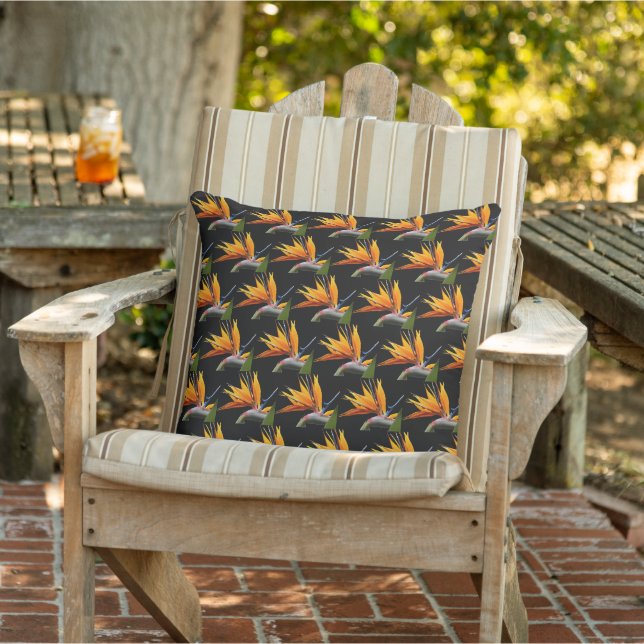 Orange Bird of Paradise Plant Pattern on Black Outdoor Pillow (Chair)