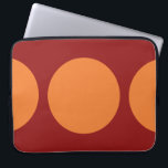 Orange Circles on Red Laptop Sleeve<br><div class="desc">This bold geometric pattern features a large orange dot in the centre and two orange half circles on the edges of a red background. If you'd like to add a monogram or image to the design, click the "Customize it!" button. Digitally created image. Copyright © 2011 Claire E. Skinner. All...</div>