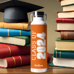 Orange Class of 2024 Personalized Graduation Water Bottle<br><div class="desc">This classic orange custom senior graduate water bottle features bold white typography reading class of 2024 in varsity letters for a high school or college graduation party keepsake gift. Customize with your name in elegant cursive script underneath for a great commemorative favour.</div>