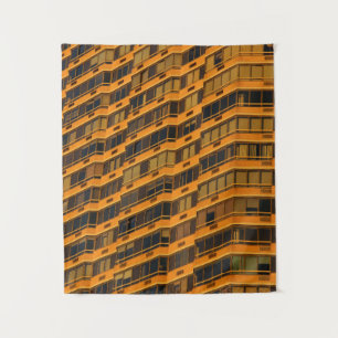Orange concrete building tapestry