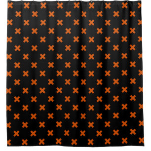 Orange cross stitches on black