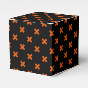 Orange cross stitches on black favor box