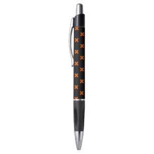 Orange cross stitches on black pen