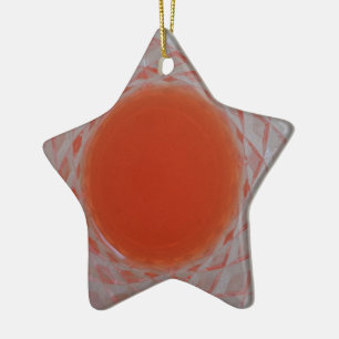 Orange drink inside a crystal glass ceramic ornament