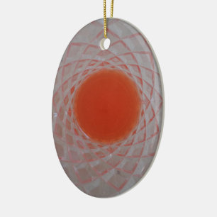 Orange drink inside a crystal glass ceramic ornament