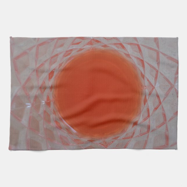 Orange drink inside a crystal glass kitchen towel (Horizontal)