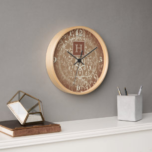 Orange Elegant Flourish Monogram Clock