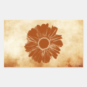 Orange flower on grungy vintage paper sticker