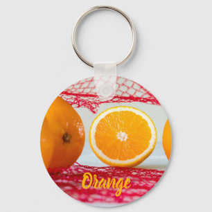 Orange fruit for vegan and vegeatrian keychain
