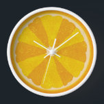 Orange Fruit Slice Pop Art Minimalist Kitchen Food Clock<br><div class="desc">This colourful orange clock is perfect for your kitchen decor. It shows a sliced open image of an orange citrus fruit with 12 fruit slices in alternating shades of orange, so you can tell time without numbers. This unusual design has a textured look - and sort of a 60s pop...</div>