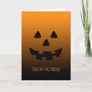 orange Halloween pumpkin face greeting card
