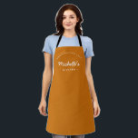 Orange Homemade with Love Custom Your Kitchen Apron<br><div class="desc">Get ready to unleash your culinary creativity with our Orange Homemade with Love Custom Your Kitchen Apron. This apron is a must-have for any passionate baker or cook who wants to add a personal touch to their kitchen attire. Customize the apron with your name, making it uniquely yours and adding...</div>
