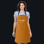 Orange Homemade with Love Custom Your Kitchen Apron<br><div class="desc">Get ready to unleash your culinary creativity with our Orange Homemade with Love Custom Your Kitchen Apron. This apron is a must-have for any passionate baker or cook who wants to add a personal touch to their kitchen attire. Customize the apron with your name, making it uniquely yours and adding...</div>