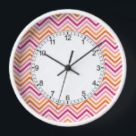 Orange & Hot Pink Chevron Pattern Clock<br><div class="desc">A bright and modern design with zigzag patterns. Click on the customize button to make more changes.</div>