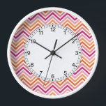 Orange & Hot Pink Chevron Pattern Clock<br><div class="desc">A bright and modern design with zigzag patterns. Click on the customize button to make more changes.</div>