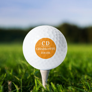 Orange initials monogram name golf balls