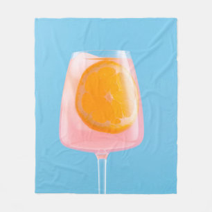 Orange juice in clear drinking glass fleece blanket
