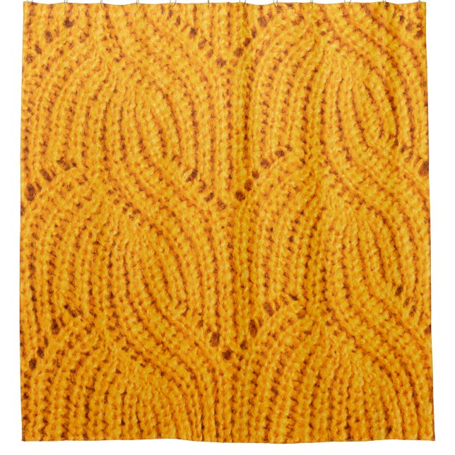 Orange knitted sweater, textured background. (Front)