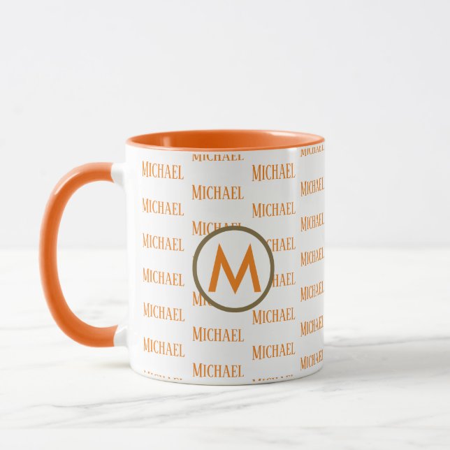 orange mug with monogram and pattern of names (Left)