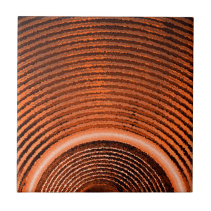 Orange music speaker and sound waves tile