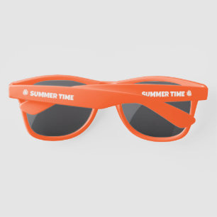 Orange party sunglasses with custom palm leaf logo