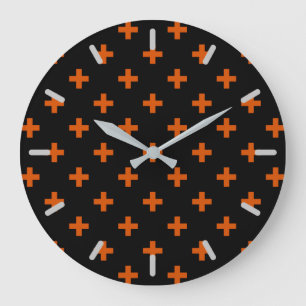 Orange polka crosses on black large clock