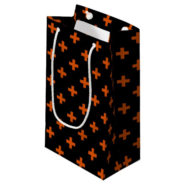 Orange polka crosses on black small gift bag (Front Angled)