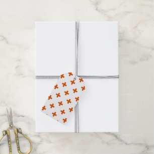 Orange polka crosses on white gift tags