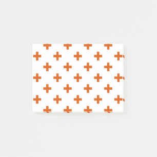 Orange polka crosses on white post-it notes