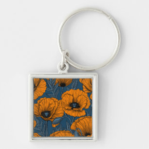 Orange poppies on dark blue keychain