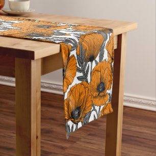 Orange poppies on white short table runner