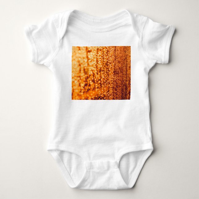 Orange raindrops on glass, abstract background. baby bodysuit (Front)