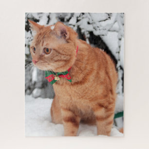 Orange Tabby Cat in the snow Jigsaw Puzzle
