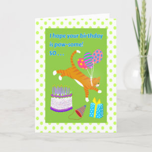 Orange Tabby Cat leaps over the Birthday Cake! Card
