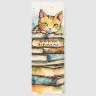 Orange Tabby Cat Perched Atop a Stack of Books
