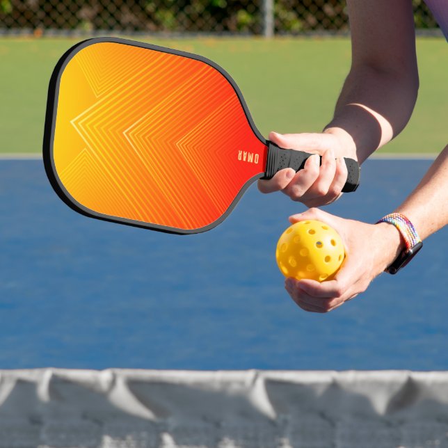 Orange to yellow geometric ombre pickleball paddle (Insitu)