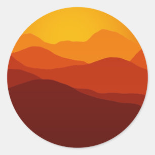 Orange Tones Sunset over Mountain Silhouettes Classic Round Sticker