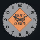 Orange Traffic Pattern Changed Road Warning Sign Large Clock<br><div class="desc">Keep your schedule on track with this traffic pattern changed wall clock. This functional piece of industrial decor features the classic orange diamond road sign as the clock face, making it a perfect addition to a home office, garage, or engineering firm. The bold design serves as a constant reminder that...</div>
