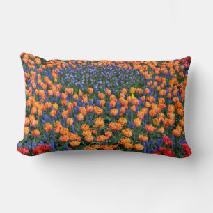 Orange tulips and muscari flowers lumbar pillow