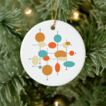 Orange Turquoise Circles Mid Century Christmas Ceramic Ornament<br><div class="desc">This fabulous mid-century modern styled ceramic ornament features circles,  ovals,  and lines - in the colours of turquoise blue,  orange,  cream,  and black. Add that hint of fun to your retro Christmas tree!</div>