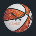 orange white feather paisley doodles basketball round clock<br><div class="desc">This unique basketball wall clock features the realistic image of a basketball that has alternating orange and white recolored panels with delicate doodle flowers,  feathers and paislies patterned on the basketball's orange panels - personalize with the athlete's name for her basketball room - by katz_d_zynes</div>