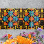 Orange Yellow Blue Symmetrical Arrangements Tile<br><div class="desc">This ceramic til features a beautiful pattern that draws the eye into a dance of colour and shape. The intricate design is characterized by symmetrical arrangements of vibrant hues, creating an optical illusion effect. The fiery orange shapes, resembling eyes or leaves, are central in the pattern, radiating a sense of...</div>