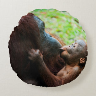 Orangutan mother and baby round pillow