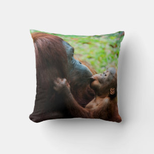 Orangutan mother and baby throw pillow