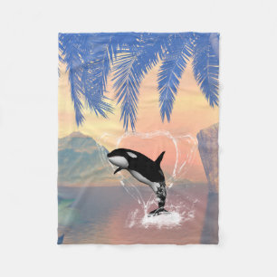 Orca jumping through a heart fleece blanket